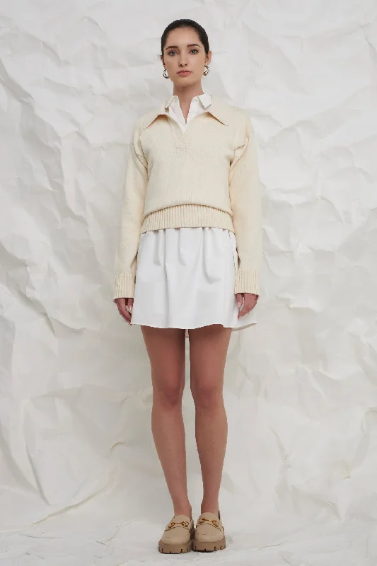 Fashionable, yet affordable women’s apparel   Collared Knit Sweater